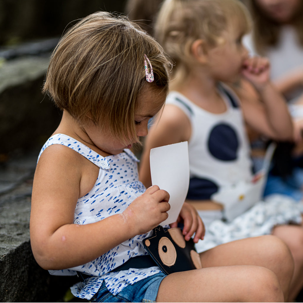 Children wearing Eperfa leather belt bags