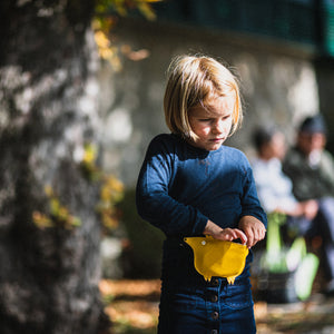 Child wearing Eperfa leather belt bag fox, yellow
